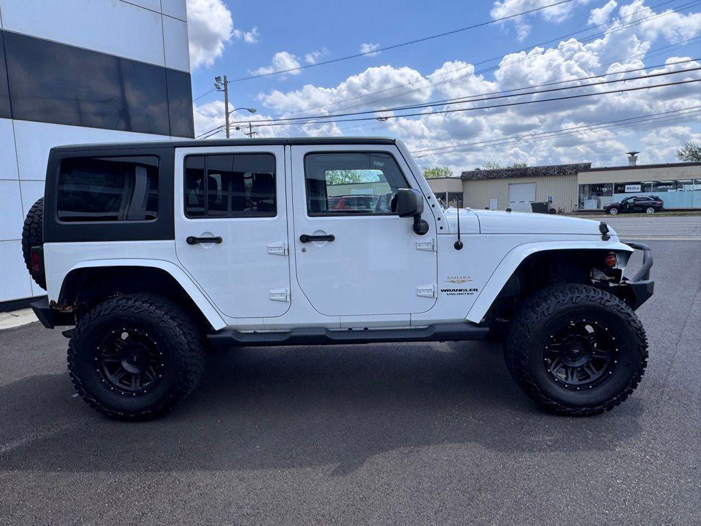 used 2014 Jeep Wrangler Unlimited car, priced at $16,991