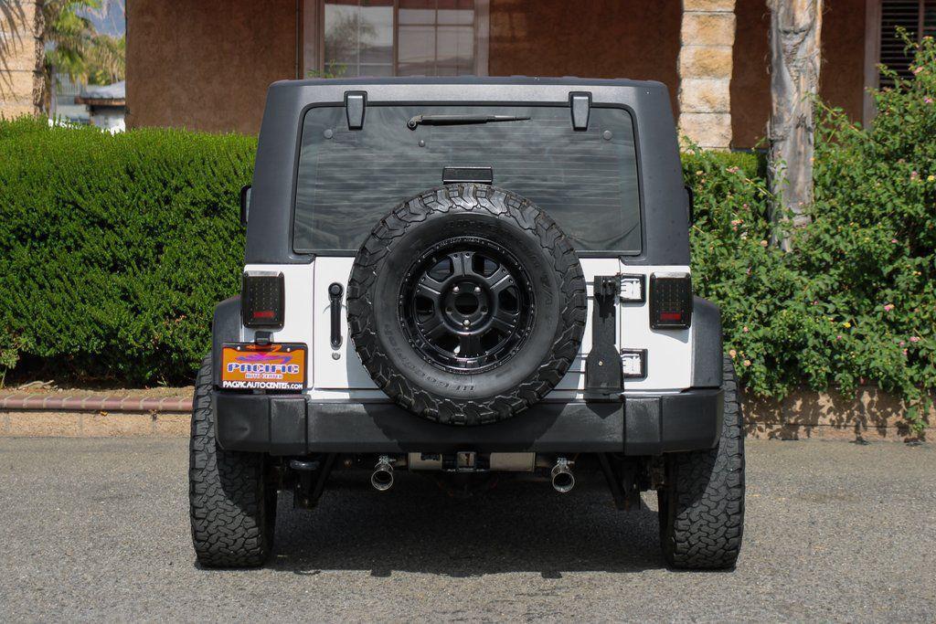 used 2015 Jeep Wrangler car, priced at $13,995