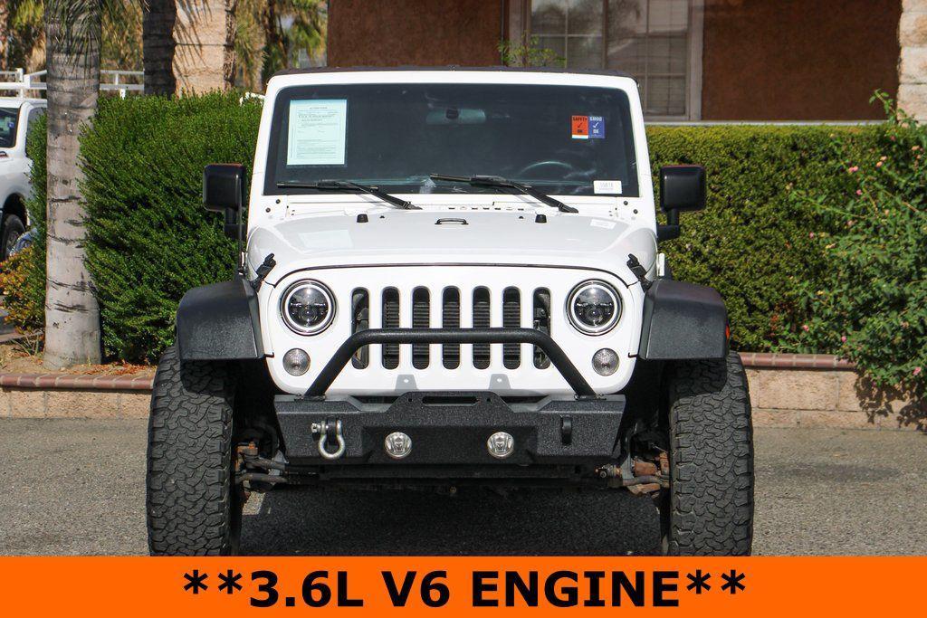 used 2015 Jeep Wrangler car, priced at $13,995