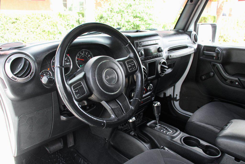 used 2015 Jeep Wrangler car, priced at $13,995