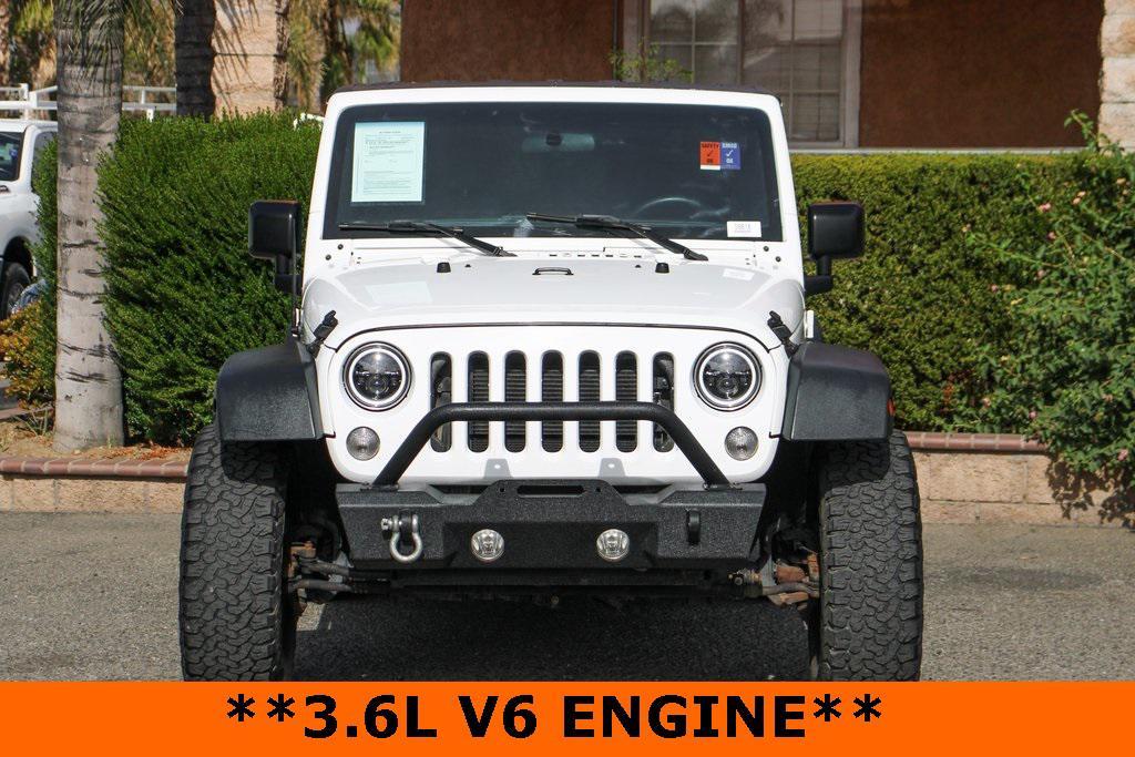 used 2015 Jeep Wrangler car, priced at $15,995