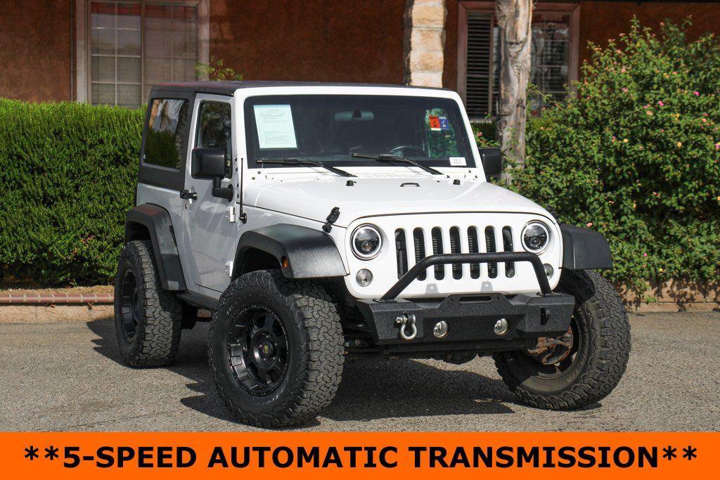 used 2015 Jeep Wrangler car, priced at $13,995
