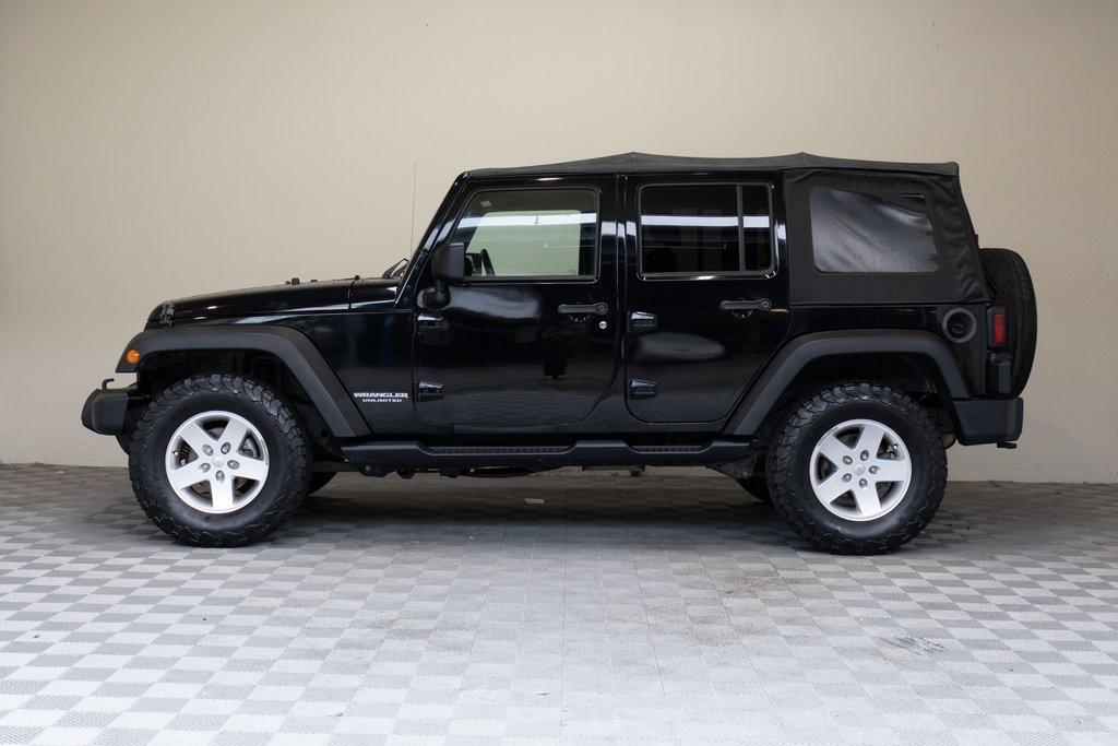 used 2012 Jeep Wrangler Unlimited car, priced at $12,995