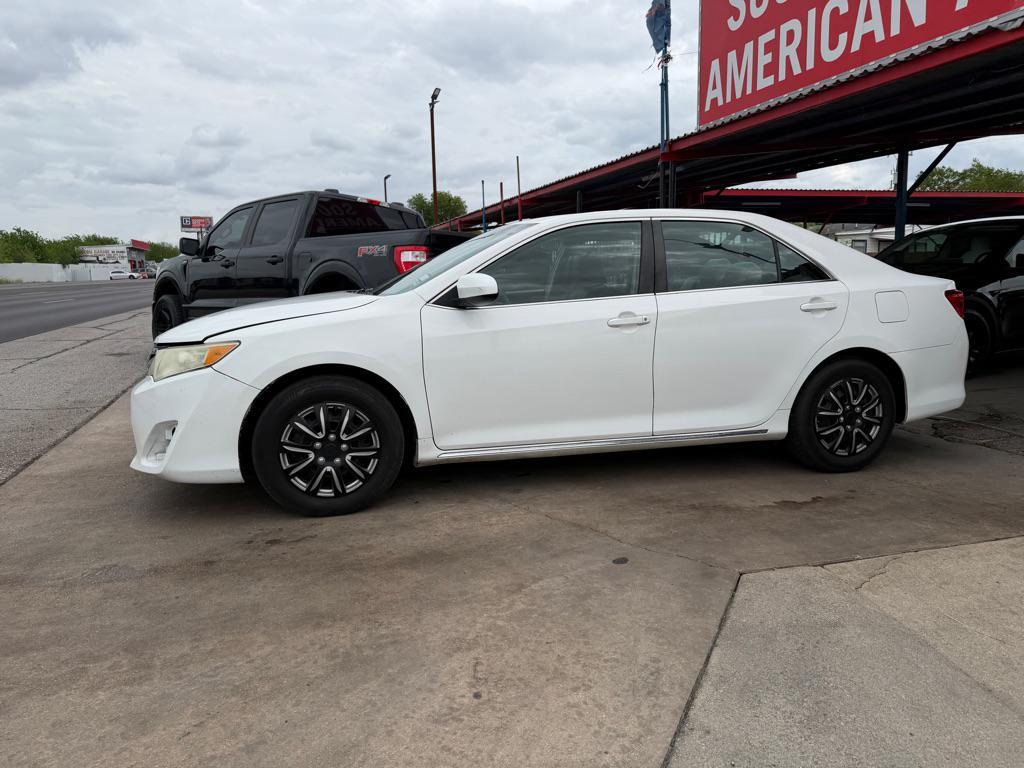 used 2014 Toyota Camry car, priced at $6,000