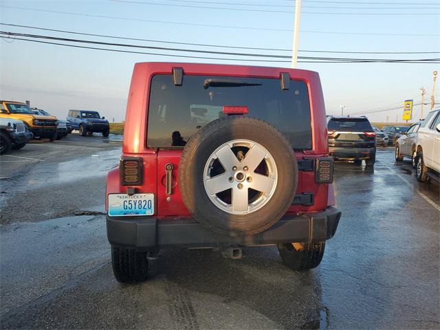 used 2011 Jeep Wrangler Unlimited car, priced at $12,681