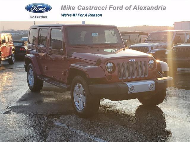 used 2011 Jeep Wrangler Unlimited car, priced at $12,681