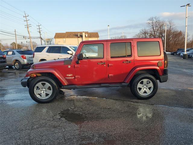 used 2011 Jeep Wrangler Unlimited car, priced at $12,681