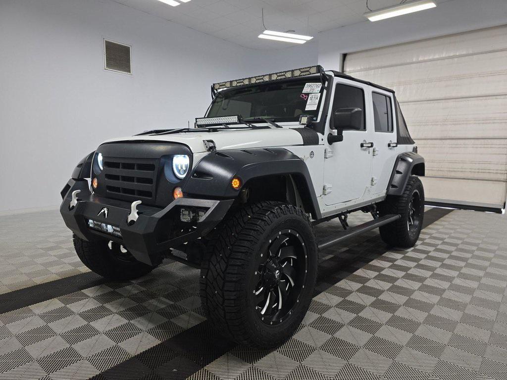 used 2016 Jeep Wrangler Unlimited car, priced at $20,243