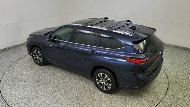 used 2021 Toyota Highlander Hybrid car, priced at $30,400
