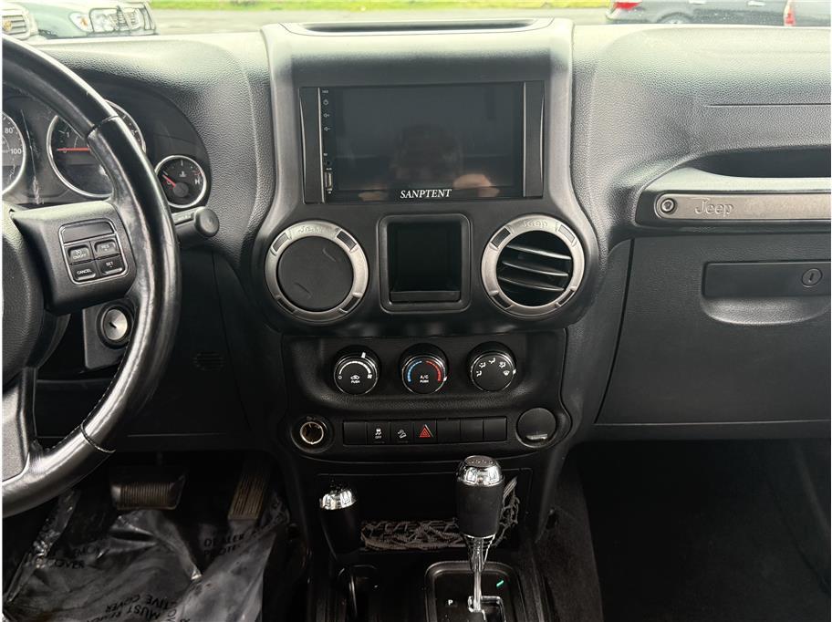 used 2012 Jeep Wrangler Unlimited car, priced at $13,999