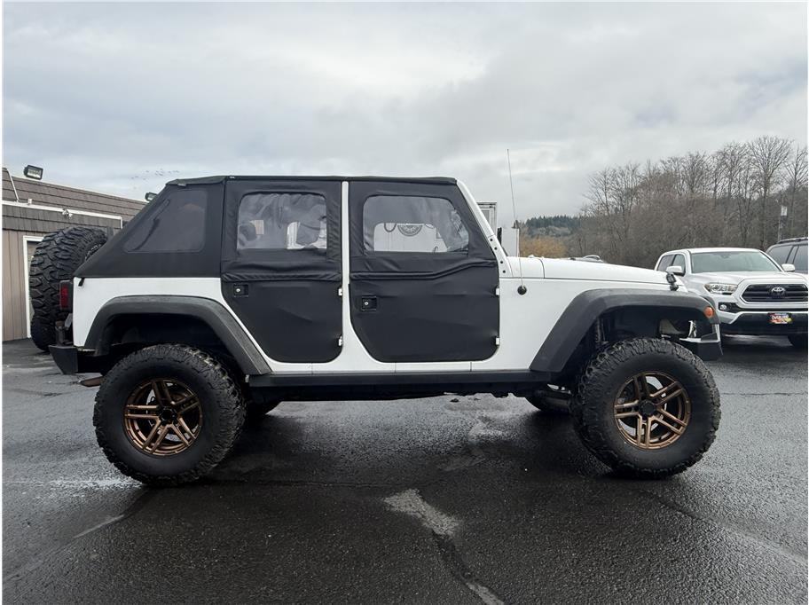 used 2012 Jeep Wrangler Unlimited car, priced at $13,999