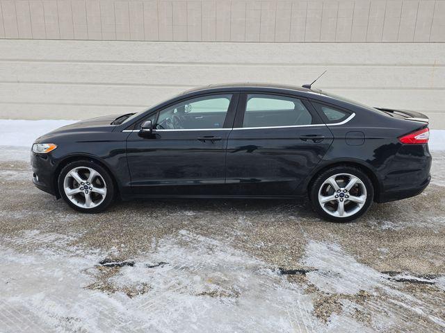 used 2014 Ford Fusion car, priced at $7,619