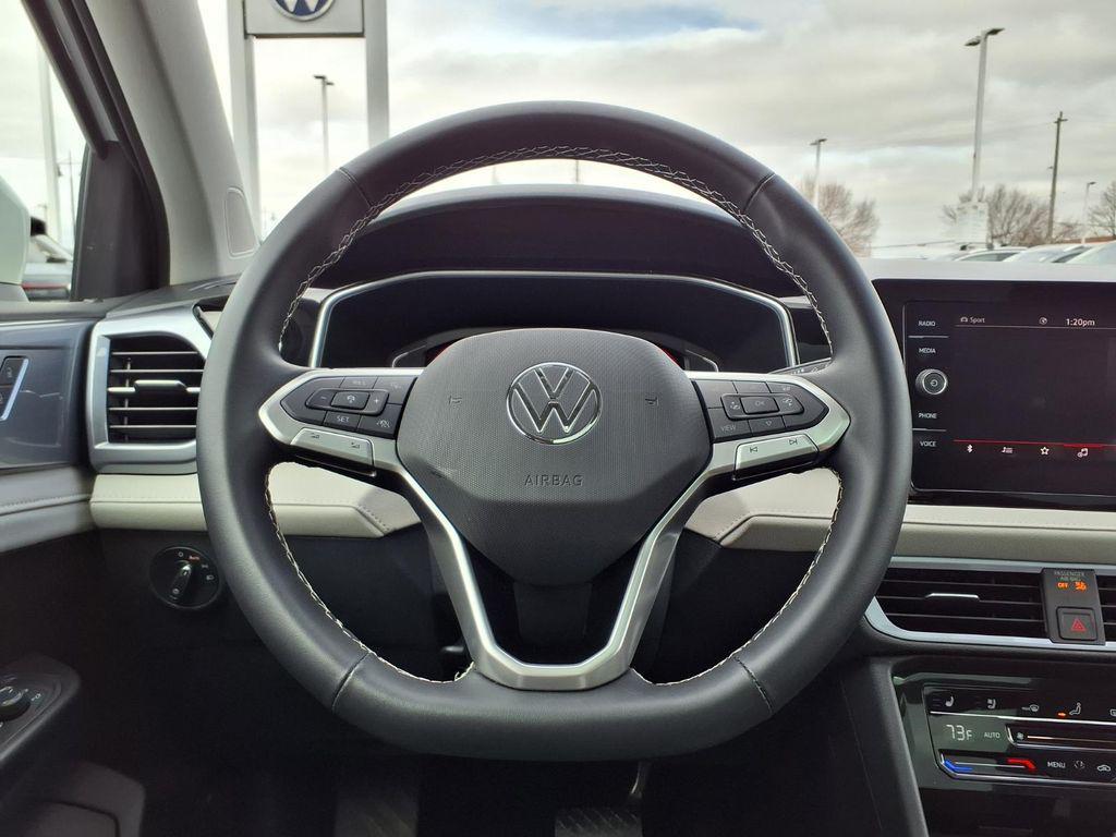 used 2025 Volkswagen Taos car, priced at $29,999
