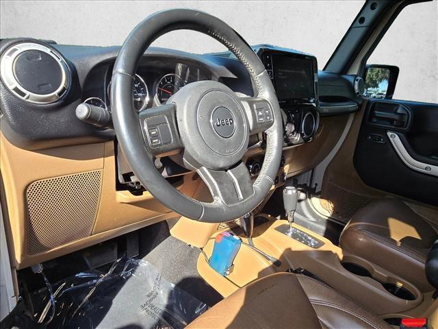 used 2016 Jeep Wrangler Unlimited car, priced at $23,889