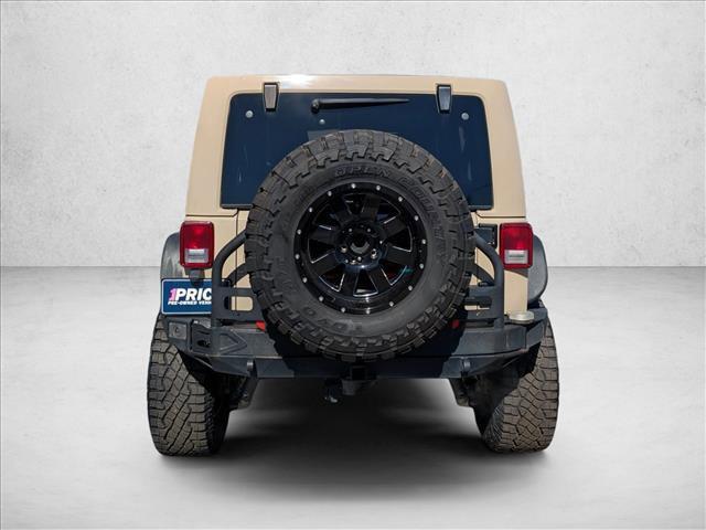 used 2016 Jeep Wrangler Unlimited car, priced at $23,889