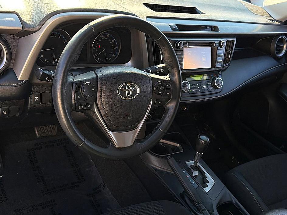 used 2018 Toyota RAV4 car, priced at $14,798