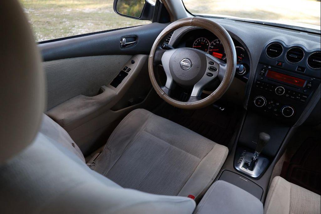 used 2010 Nissan Altima car, priced at $2,900