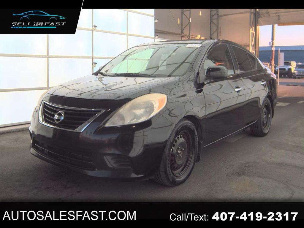 used 2014 Nissan Versa car, priced at $2,900