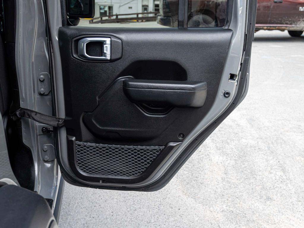 used 2023 Jeep Wrangler car, priced at $31,240