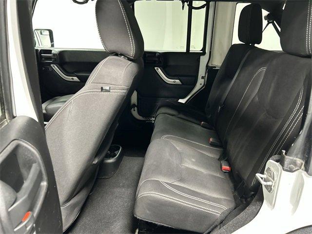 used 2013 Jeep Wrangler Unlimited car, priced at $14,524