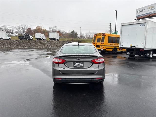 used 2013 Ford Fusion car, priced at $4,995