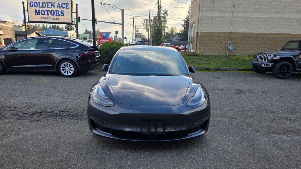 used 2023 Tesla Model 3 car, priced at $19,997