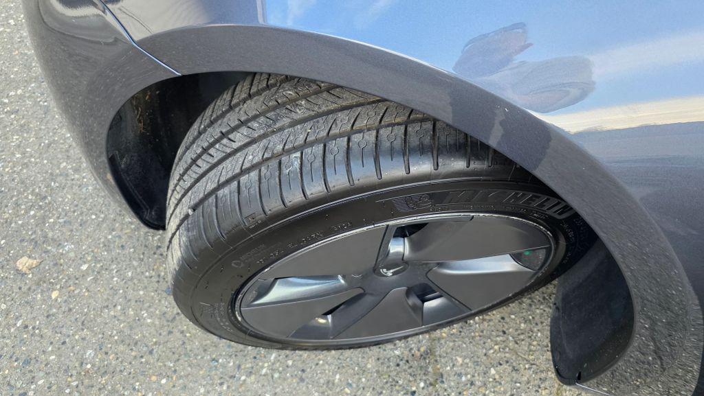 used 2023 Tesla Model 3 car, priced at $19,997