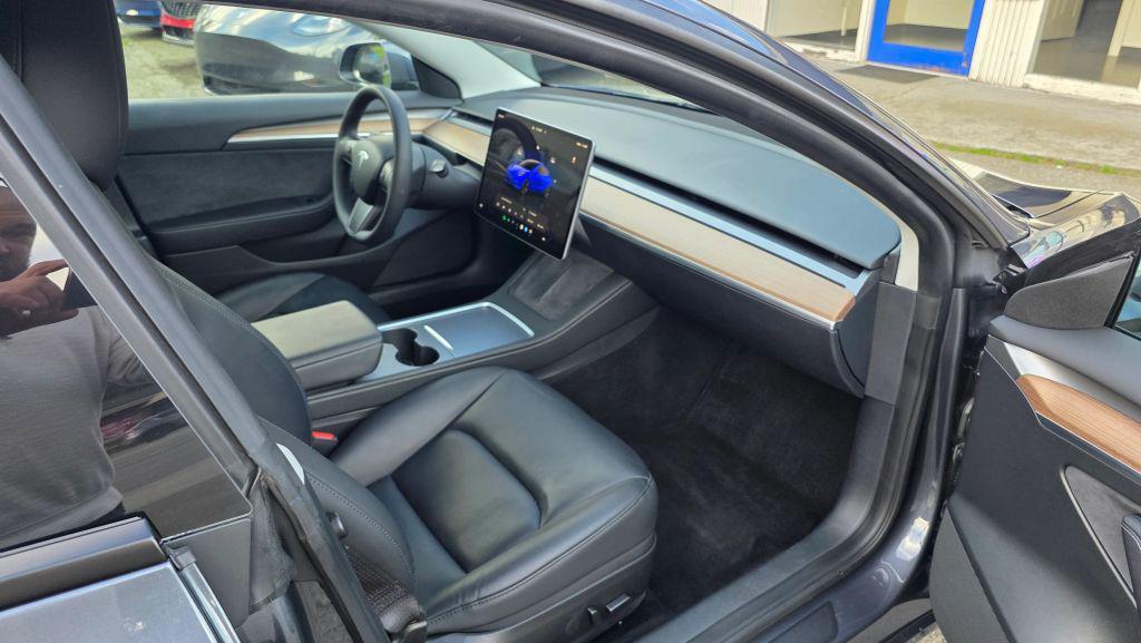 used 2023 Tesla Model 3 car, priced at $19,997