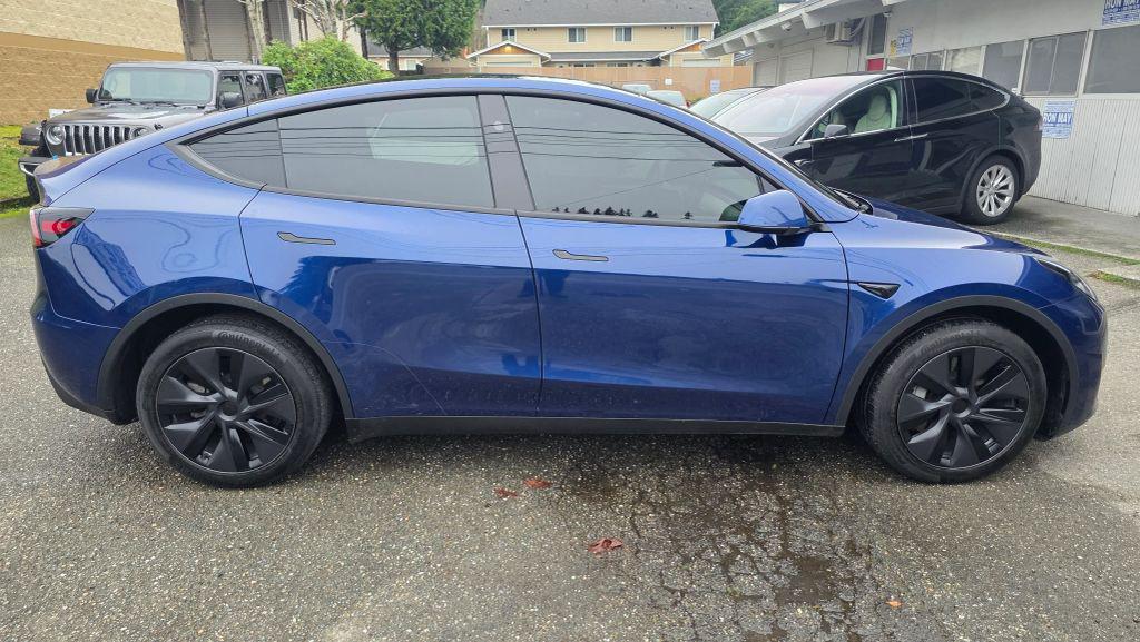used 2025 Tesla Model Y car, priced at $26,995