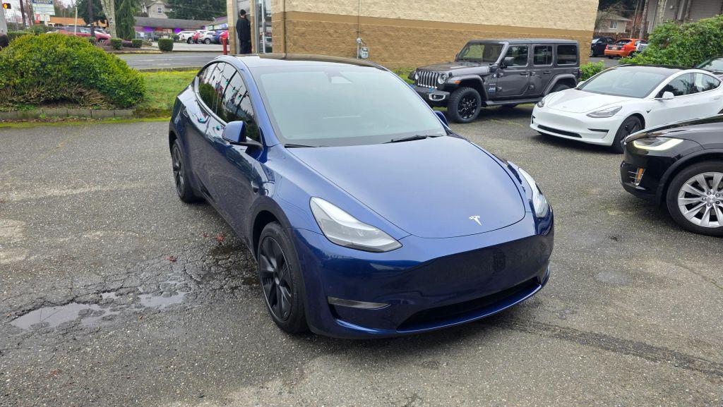 used 2025 Tesla Model Y car, priced at $26,995