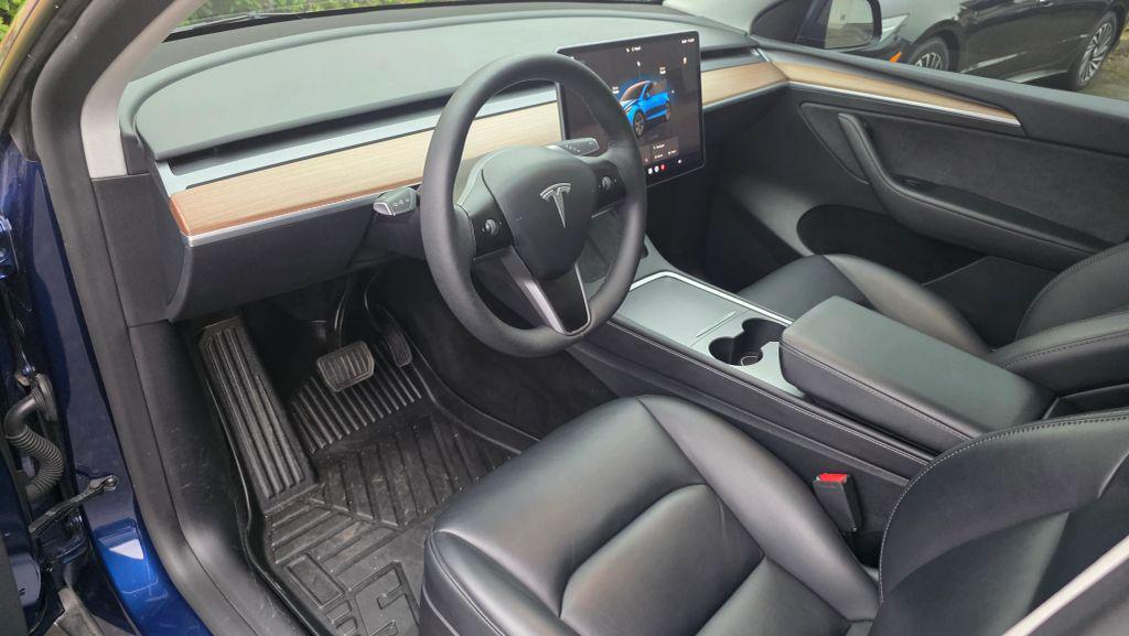 used 2025 Tesla Model Y car, priced at $26,995