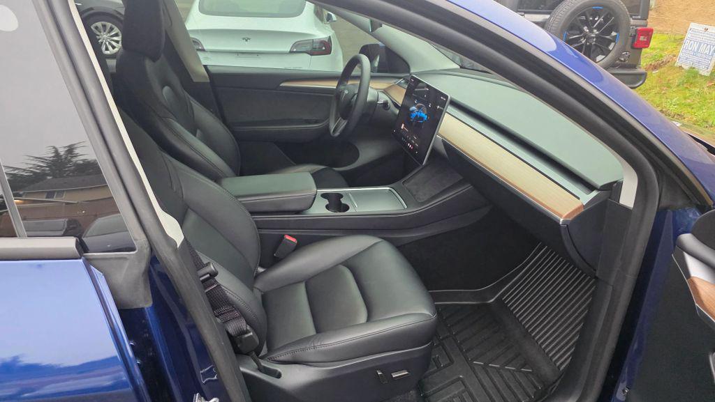 used 2025 Tesla Model Y car, priced at $26,995