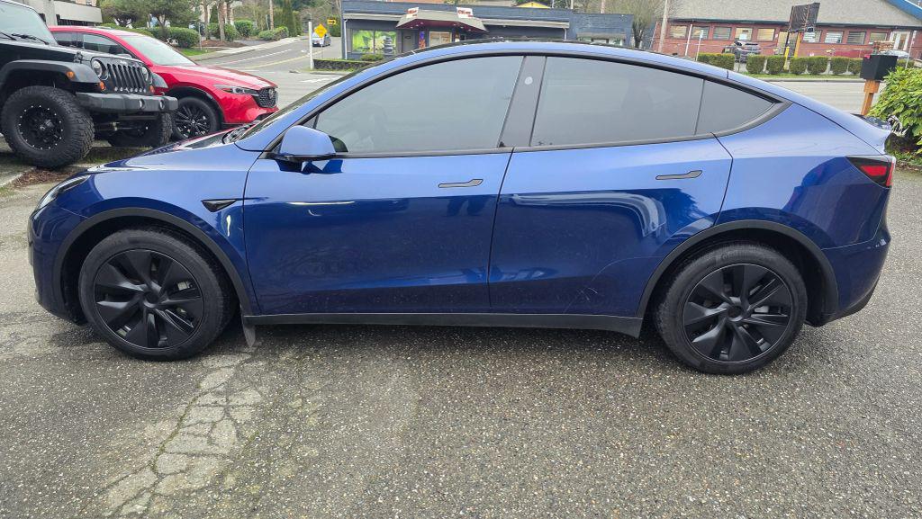 used 2025 Tesla Model Y car, priced at $26,995