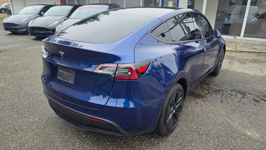used 2025 Tesla Model Y car, priced at $26,995