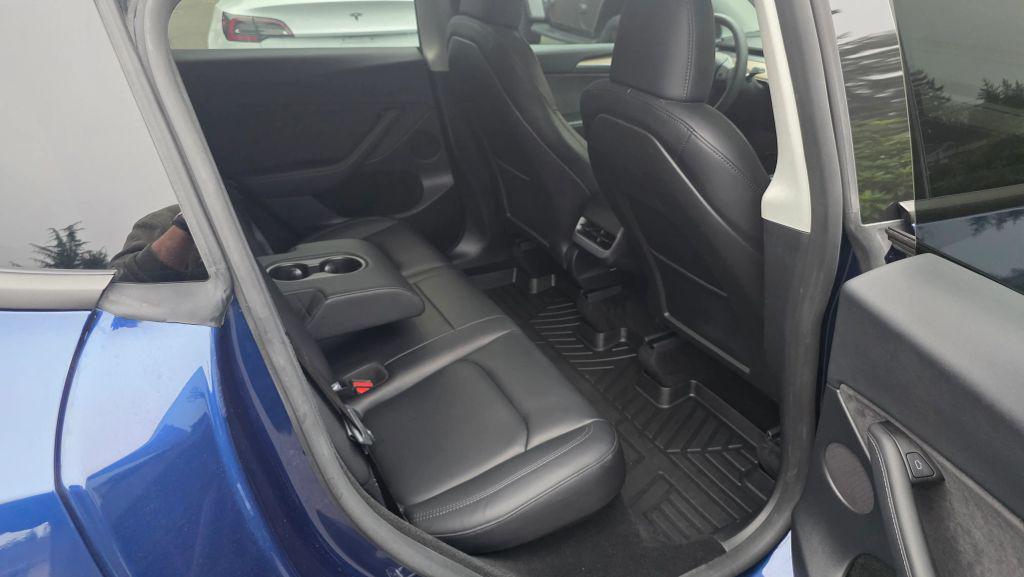 used 2025 Tesla Model Y car, priced at $26,995