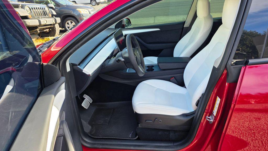 used 2023 Tesla Model Y car, priced at $24,997