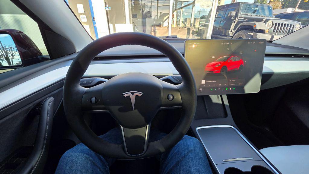 used 2023 Tesla Model Y car, priced at $24,997