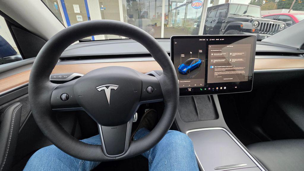 used 2023 Tesla Model Y car, priced at $22,995