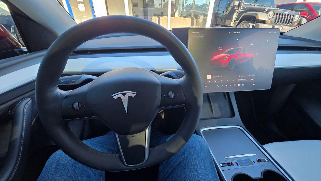 used 2024 Tesla Model Y car, priced at $27,997