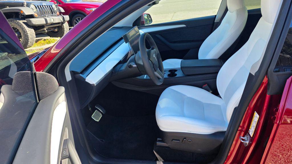 used 2024 Tesla Model Y car, priced at $27,997