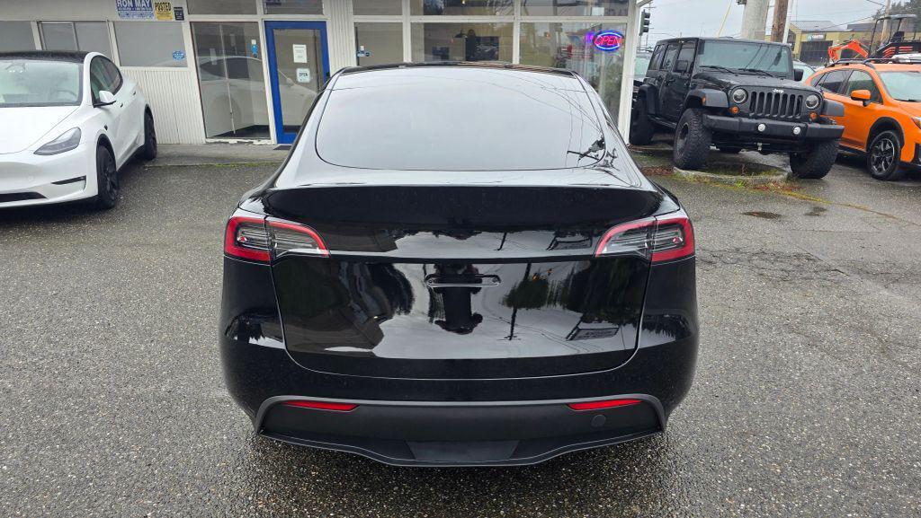used 2023 Tesla Model Y car, priced at $25,997