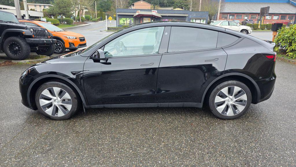 used 2023 Tesla Model Y car, priced at $25,997