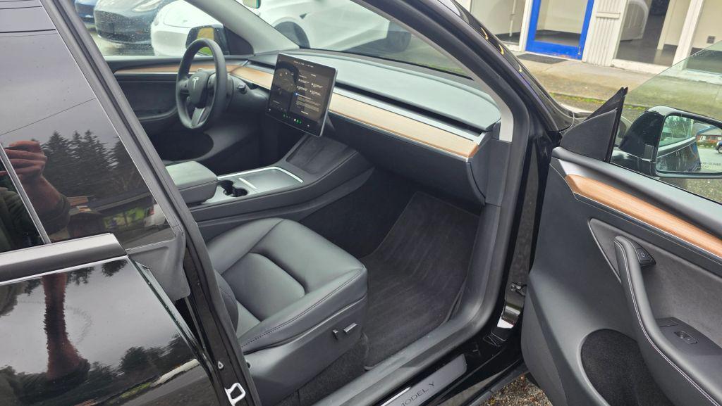 used 2023 Tesla Model Y car, priced at $25,997