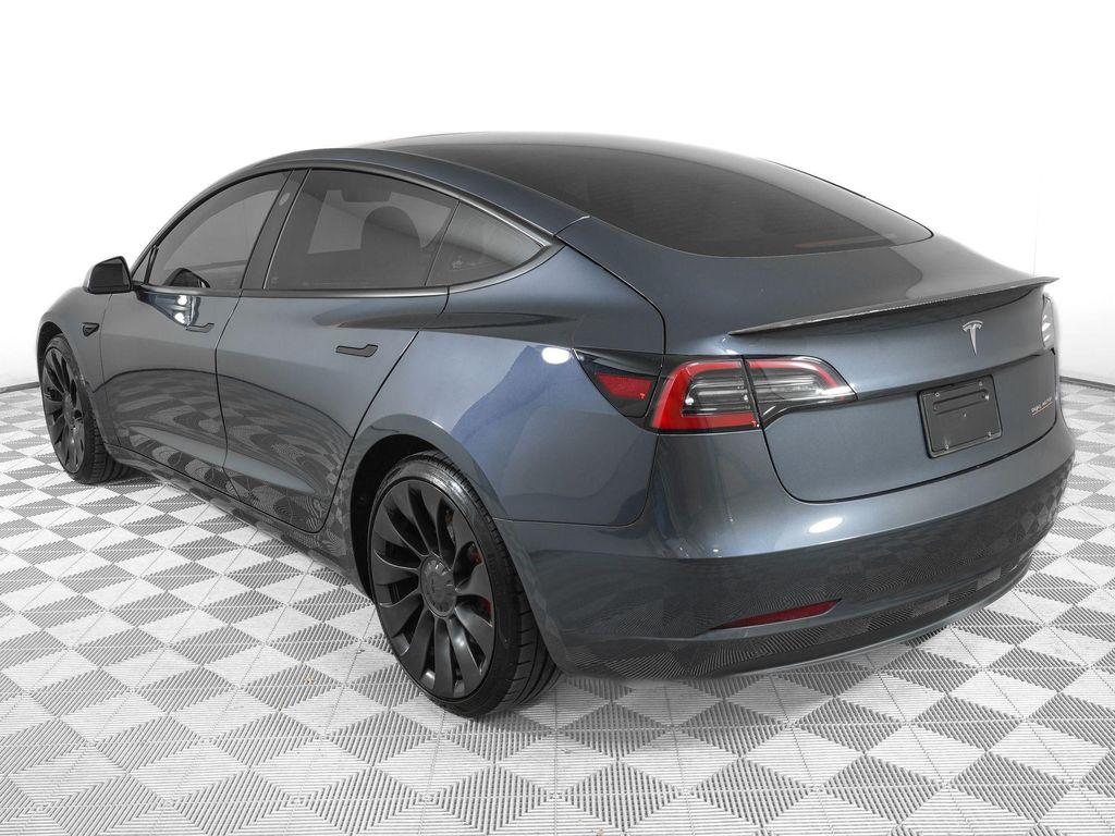 used 2023 Tesla Model 3 car, priced at $31,629