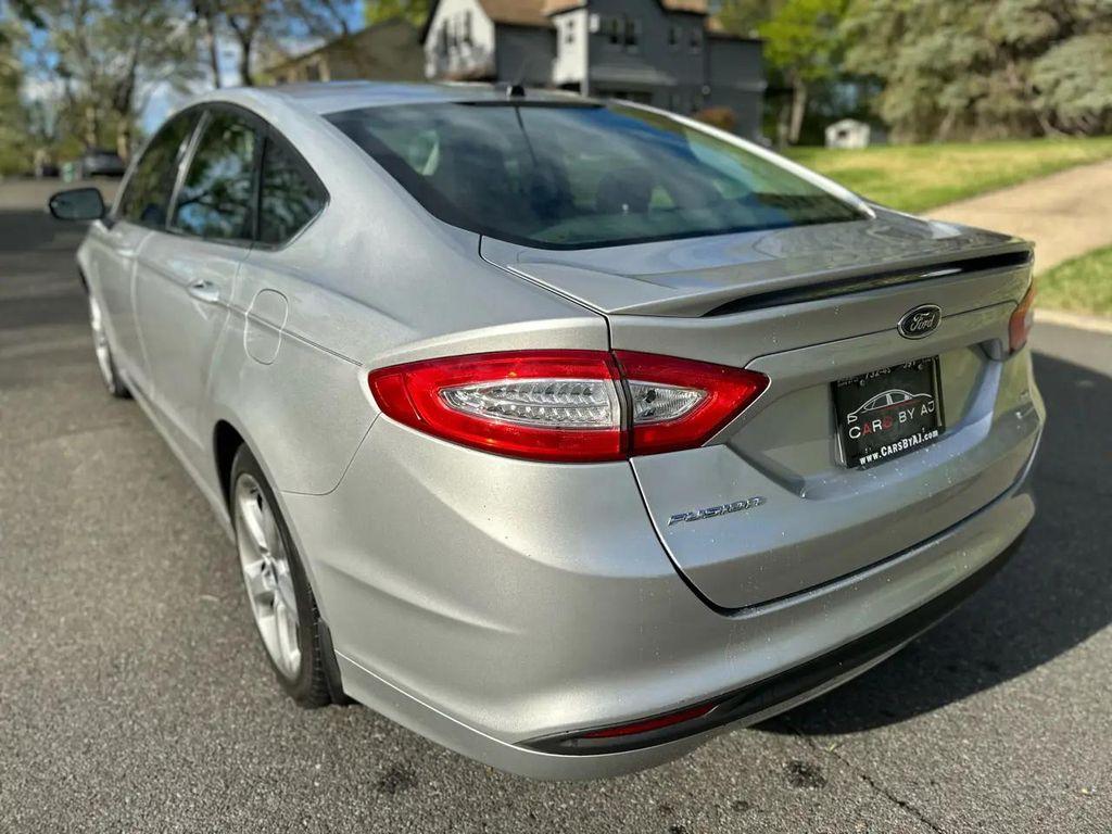 used 2015 Ford Fusion car, priced at $4,995