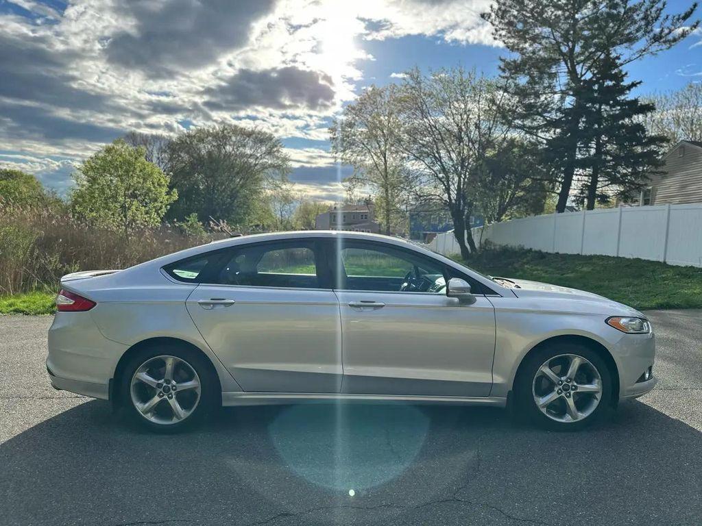 used 2015 Ford Fusion car, priced at $4,995