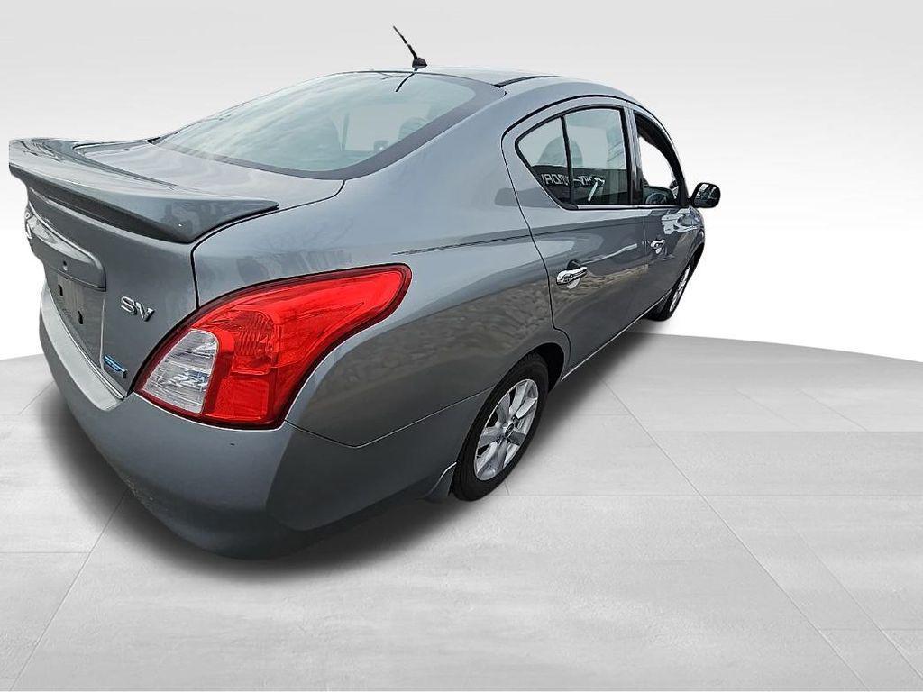 used 2014 Nissan Versa car, priced at $4,853