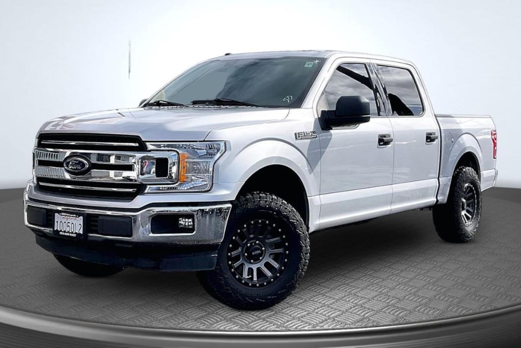 used 2018 Ford F-150 car, priced at $19,165
