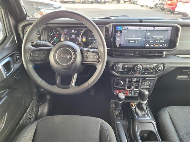 used 2024 Jeep Wrangler 4xe car, priced at $31,900