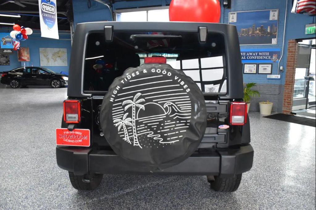 used 2016 Jeep Wrangler Unlimited car, priced at $10,491